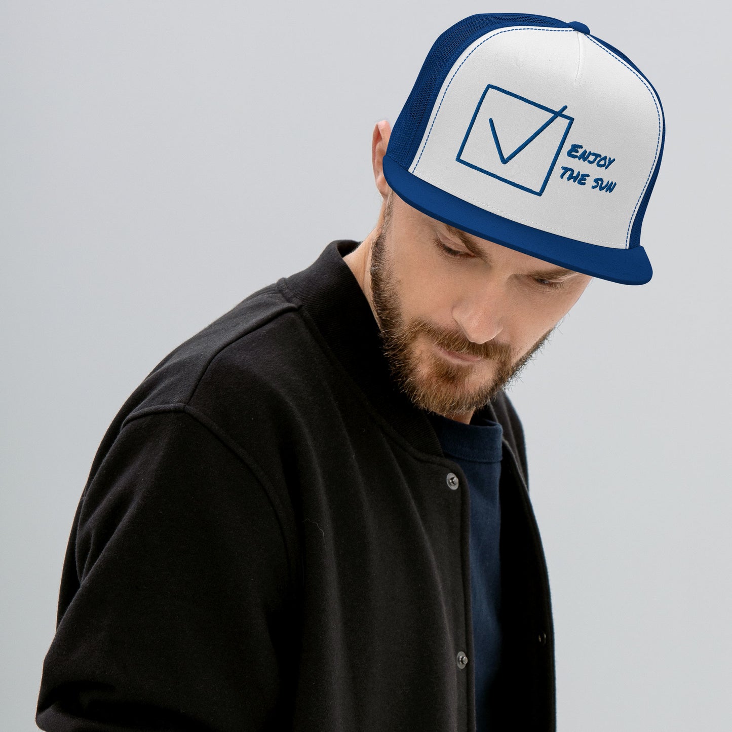 Casquette Trucker de couleur bleue "Enjoy The Sun"