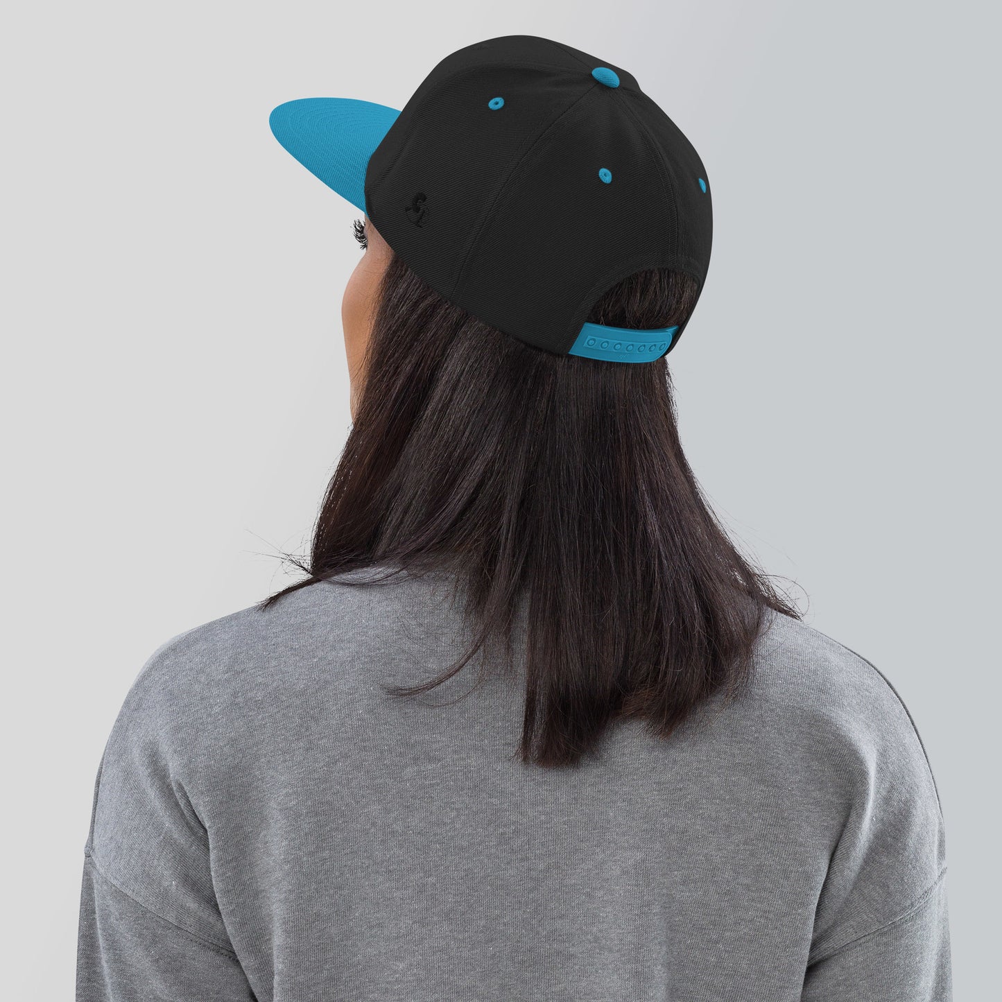 Casquette SnapBack de couleur noire et bleue "Casquettes Land"