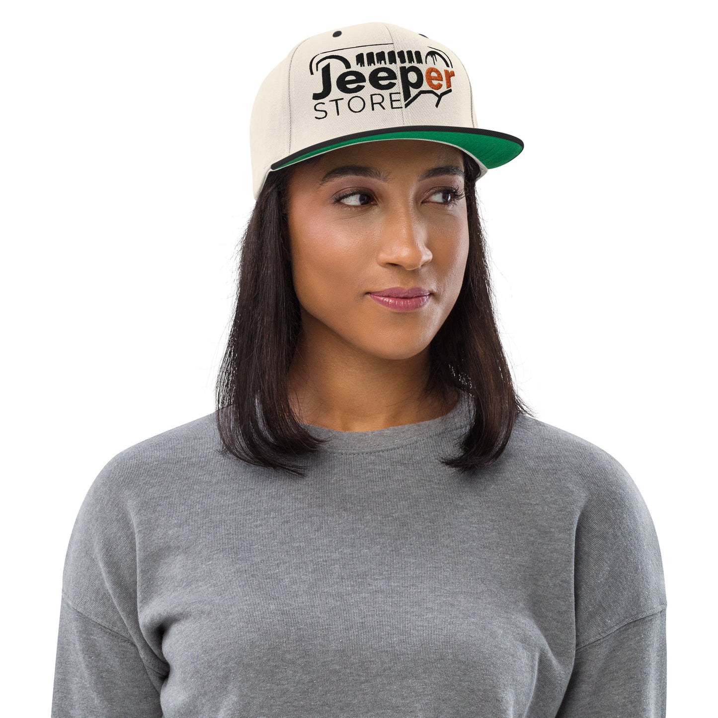 Casquette SnapBack de couleur beige et noire "Jeeper Store"